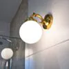 Vägglampa Mässing - Rosendal