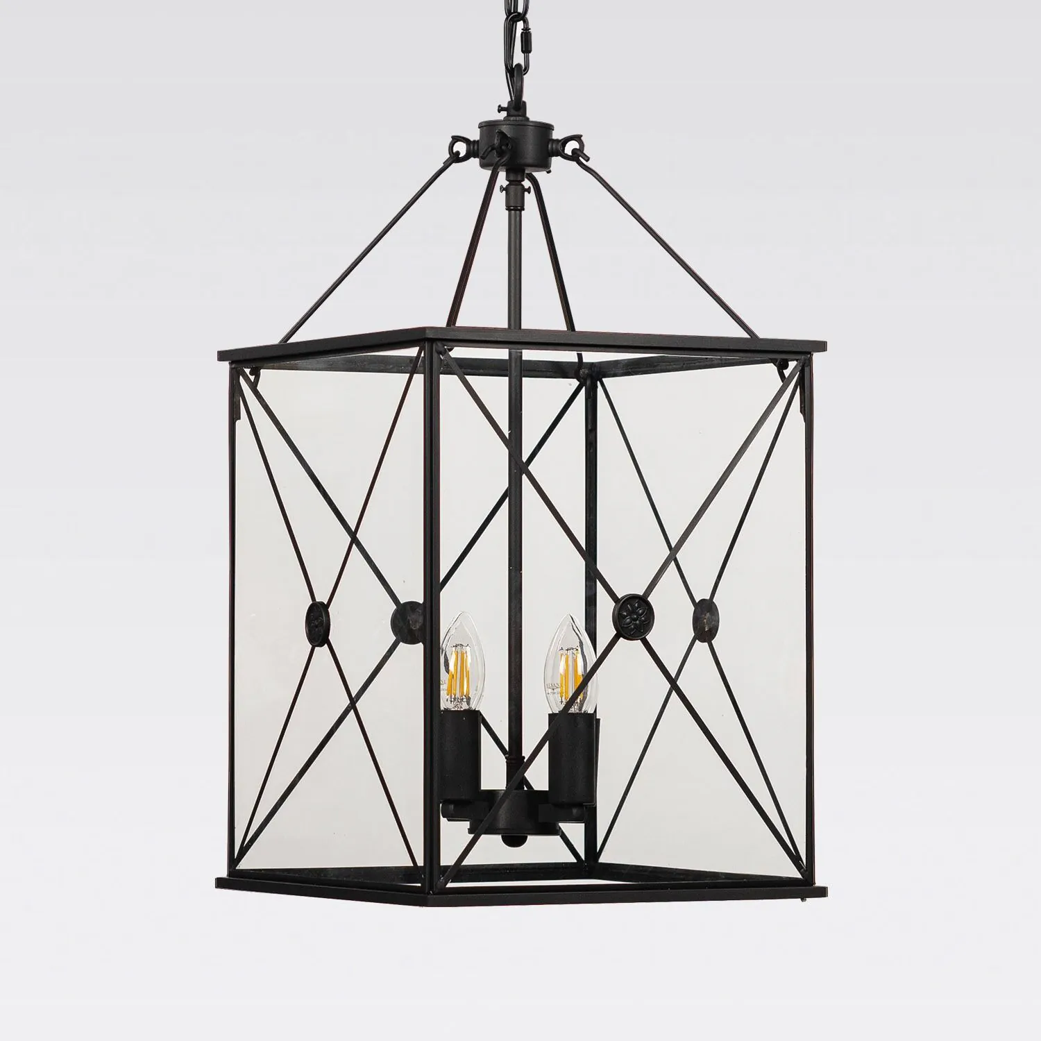 Svart smidesinspirerad taklykta