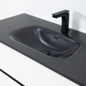 Modern och minimalistiskt tvättställ i svart akryl Modern och minimalistiskt tvättställ i svart akryl