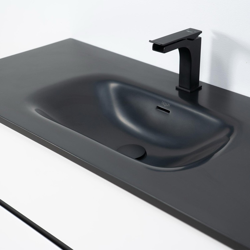 Modern och minimalistiskt tvättställ i svart akryl Modern och minimalistiskt tvättställ i svart akryl